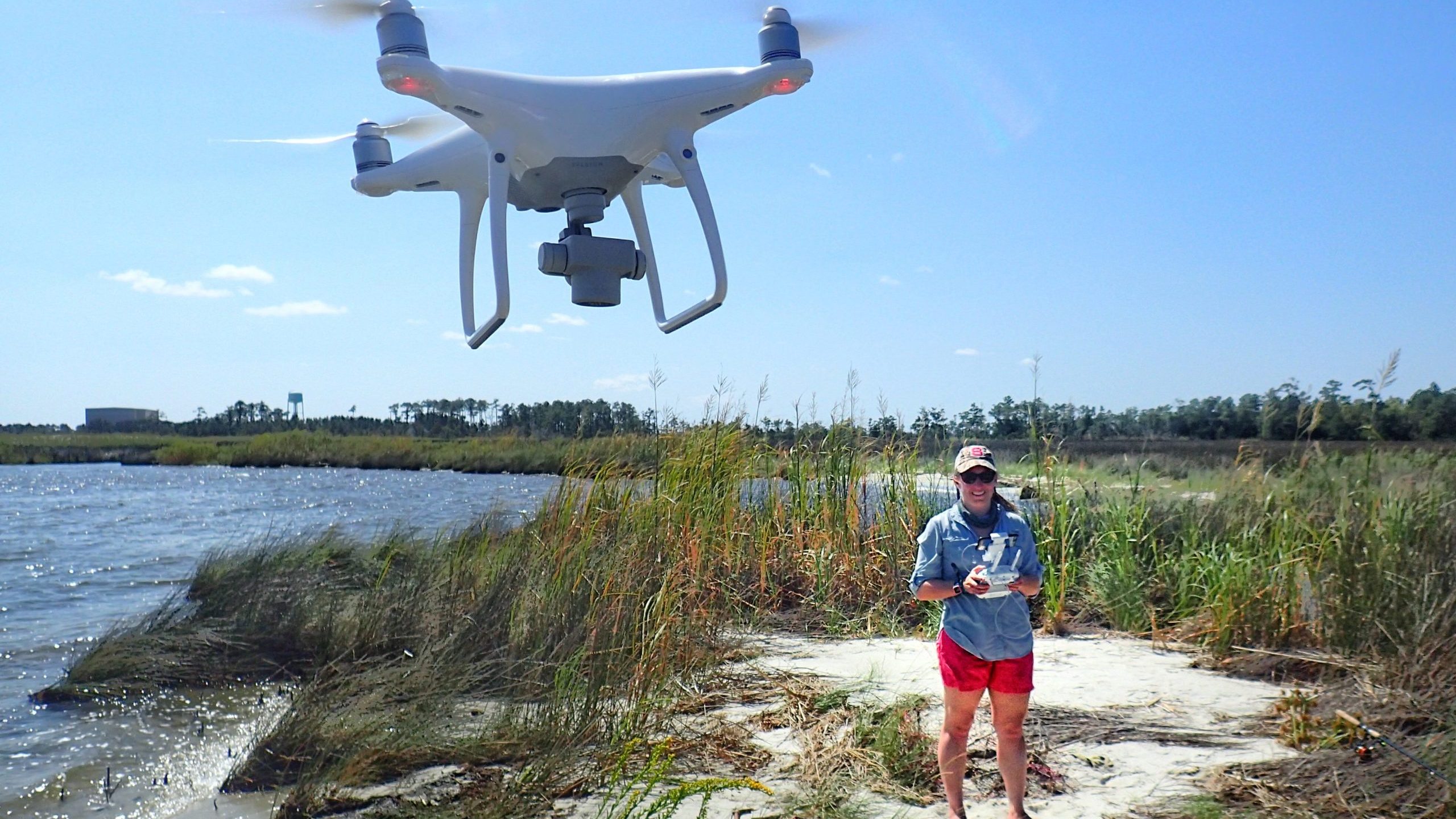 Erin Voigt flying the drone that she uses in her research