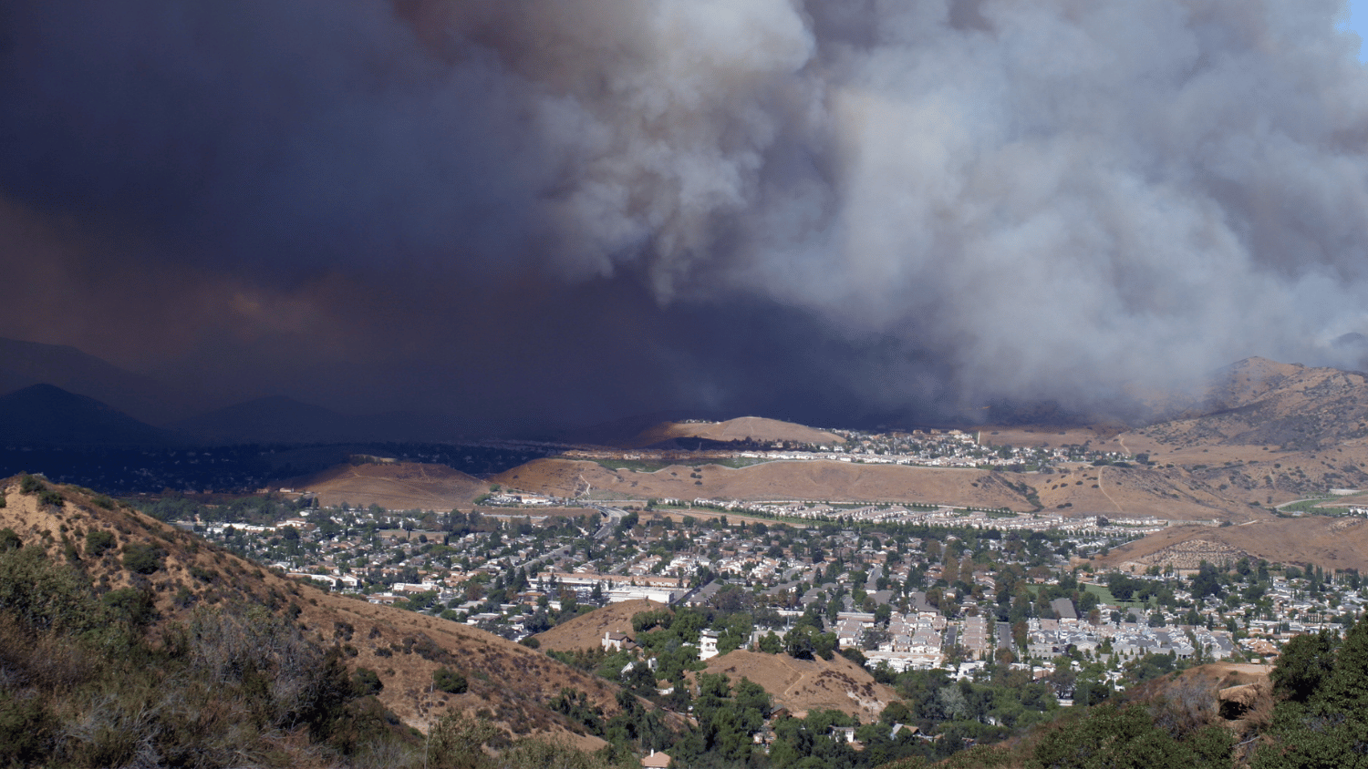 Smoke from a fire over a small town